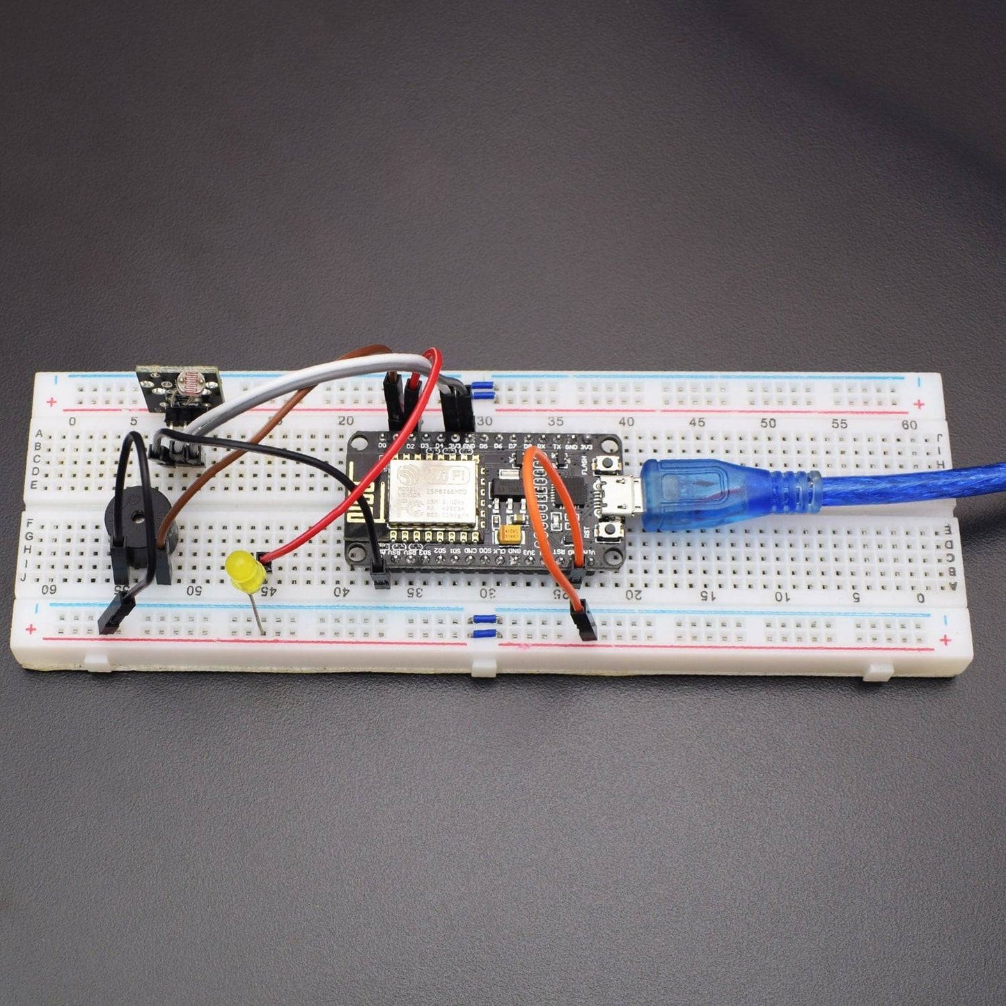 Make a IOT LDR Alarm circuit using LDR module and NodeMCU ESP8266-12E Wi-Fi Module - KT571 - REES52